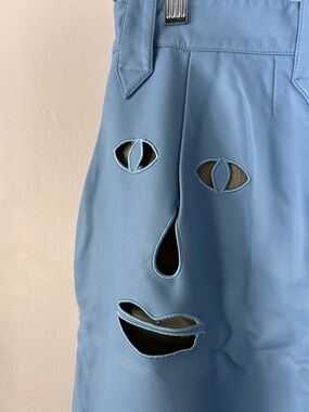 Blue Faux Leather Pants with Playful Cutout Face on Rear- Fashion Brand Company